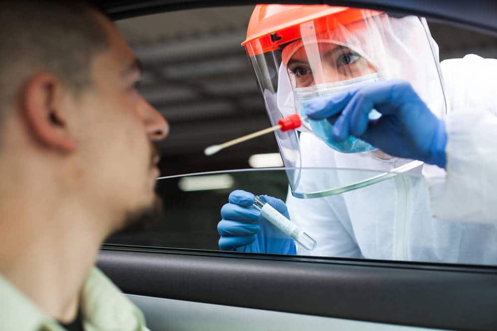 medical-nhs-uk-worker-performing-drivethru-covid-rates-free-tests-coronavirus-test medical-nhs-uk-worker-performing-drivethru-covid-rates-free-tests-coronavirus-test